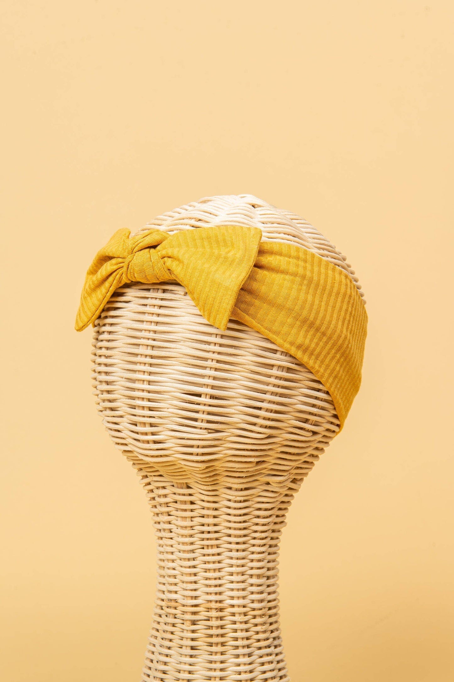 Made from the most luxuriously soft bamboo fabric, in a trendy ribbed texture. The fabric is incredibly soft, and super stretchy. With a removable bow, this also doubles as a plain headband. Perfect for newborns, infants & toddlers.
