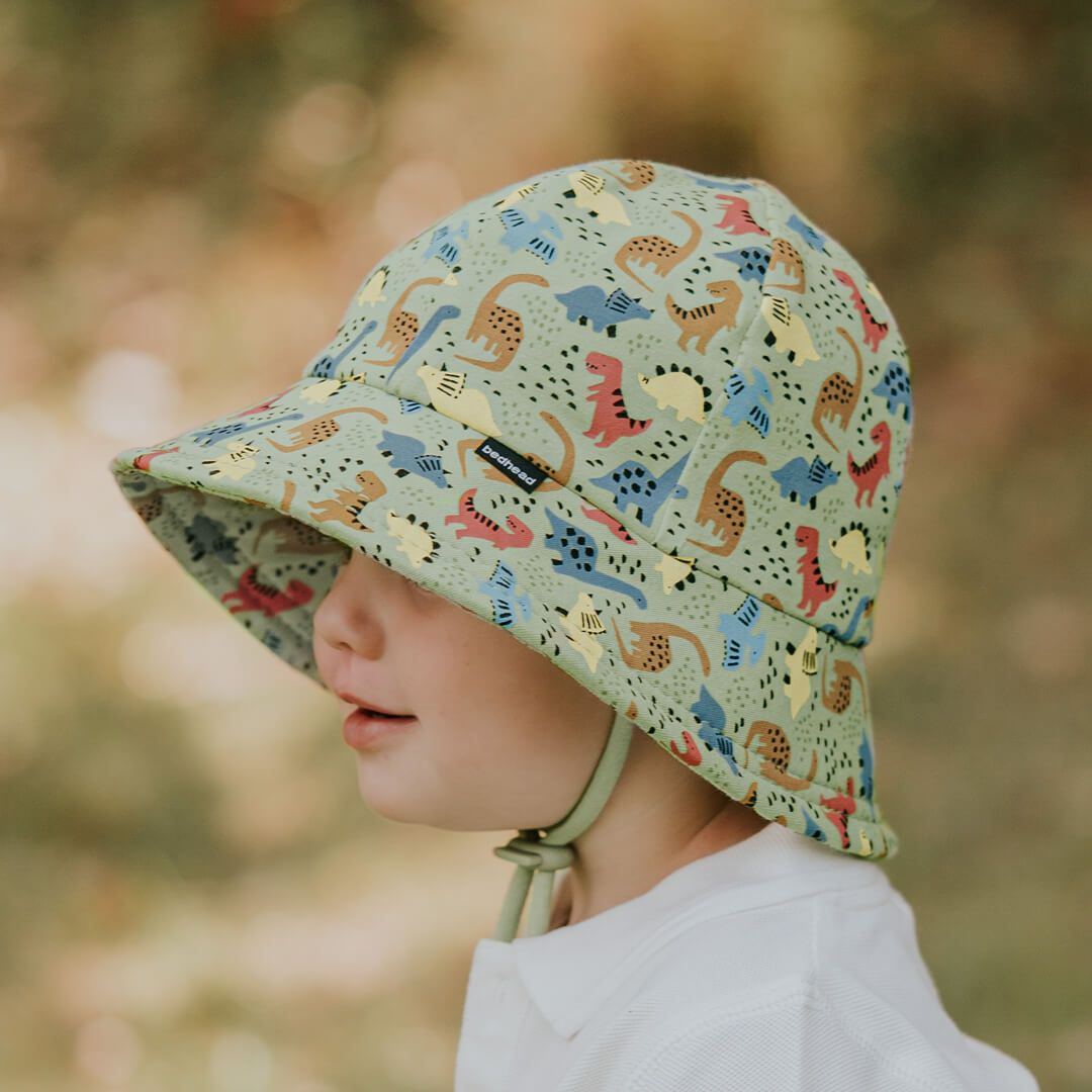 Our Toddler Buckets have a soft flexible brim that introduces babies and toddlers to an angled brim that frames their line of sight. All Bedhead hats are made from our super-stretchy and lightweight cotton jersey and come with a stretchy chin strap