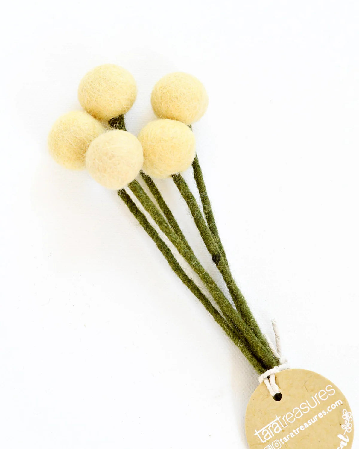 Light Yellow Hand-felted with attention to detail, this set of 5 Felt Billy Bottoms feature a calming pastel hue. Made entirely from NZ wool felt and natural dye colours, you will never have to replace these flowers. There is a wire in the stem of each billy button so that you can add these to a floral arrangement.