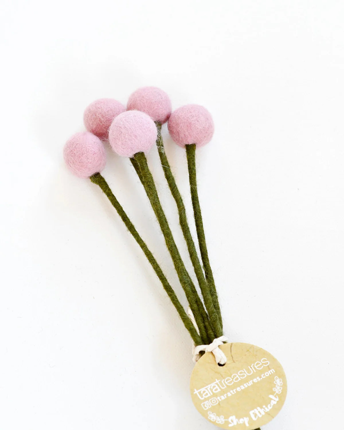 Light Pink Hand-felted with attention to detail, this set of 5 Felt Billy Bottoms feature a calming pastel hue. Made entirely from NZ wool felt and natural dye colours, you will never have to replace these flowers. There is a wire in the stem of each billy button so that you can add these to a floral arrangement.