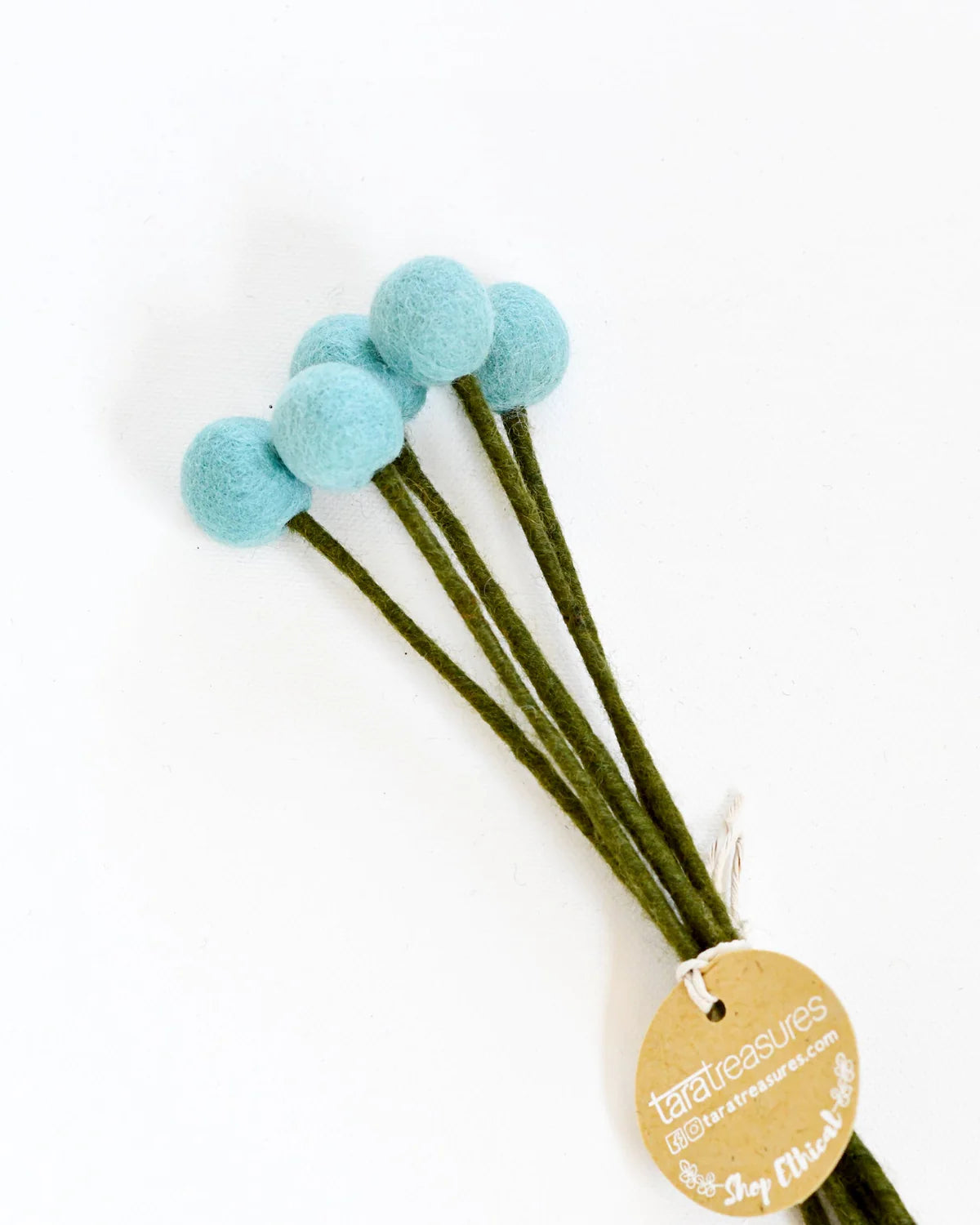 Bright Blue Hand-felted with attention to detail, this set of 5 Felt Billy Bottoms feature a calming pastel hue. Made entirely from NZ wool felt and natural dye colours, you will never have to replace these flowers. There is a wire in the stem of each billy button so that you can add these to a floral arrangement.
