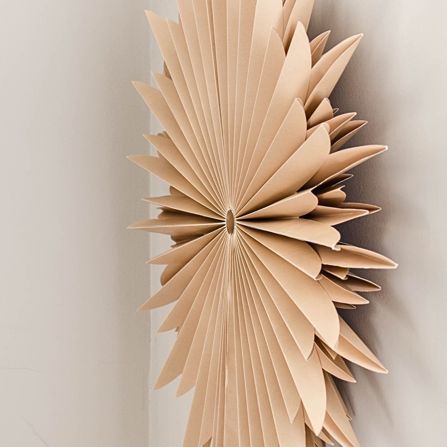 The vision was to create a show-stopping piece for you to hang in your homes, either in your window letting the light shine through its magical silhouette, or against a wall as a décor feature. Simply breathtaking just as they are, or group them together to create a statement. The hanging ornaments fold away with a magnetic closure for easy storage and shipping.