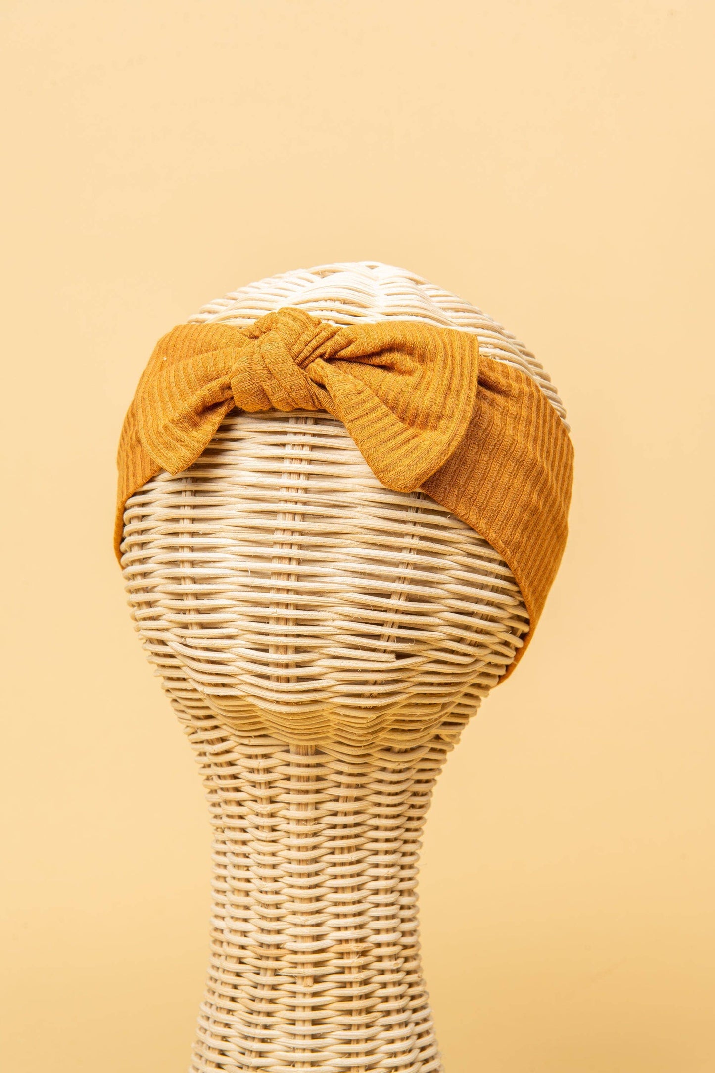 Made from the most luxuriously soft bamboo fabric, in a trendy ribbed texture. The fabric is incredibly soft, and super stretchy. With a removable bow, this also doubles as a plain headband. Perfect for newborns, infants & toddlers.