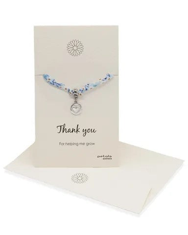 Gorgeous Liberty print ribbon bracelet with adjustable clasp & pewter charm, mounted on a quoted