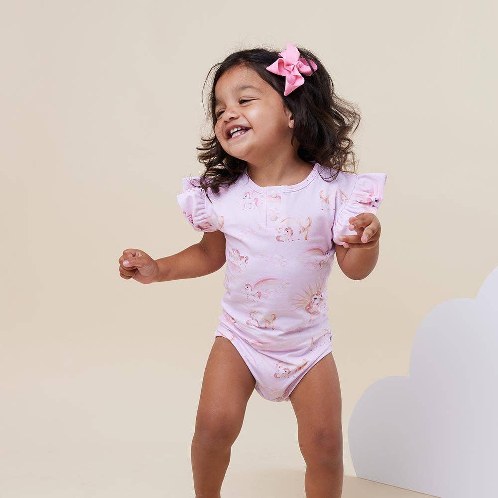 Soft and stretchy, These bodysuits are easy-care and coordinate well with Bloomers, pants and shorts.  The bloomers have sweet frills to match the sleeves on this style. Our bodysuits are also really comfortable to sleep in.   Unicorn is part of Snuggle Hunnys Limited Edition Magic Collection. This collection will not be returning to Snuggle Hunny so once it's gone it's gone.