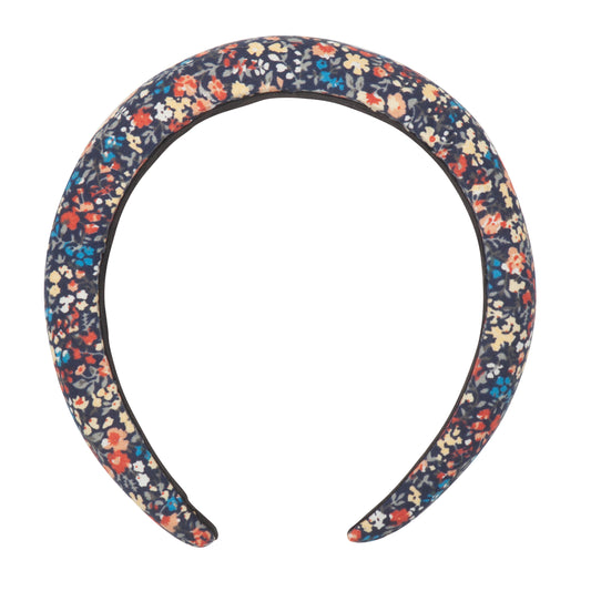 Update their autumnal style with our Fleur padded alice band! A classic (and comfortable!) alice band with a modern twist in a perfectly pretty autumnal print!  • Alice band to fit ages 3-10 years • Warning! Not suitable for children under 36 months