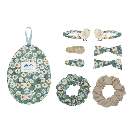 This beautifully unique Easter egg is the sweetest alternative to chocolate! An oh-so-pretty, daisy print fabric egg filled with a selection of eight beautiful&nbsp;hair accessories. This little gift will be sure to keep them smiling long after the chocolates are gone! Perfect for re-filling next year too!