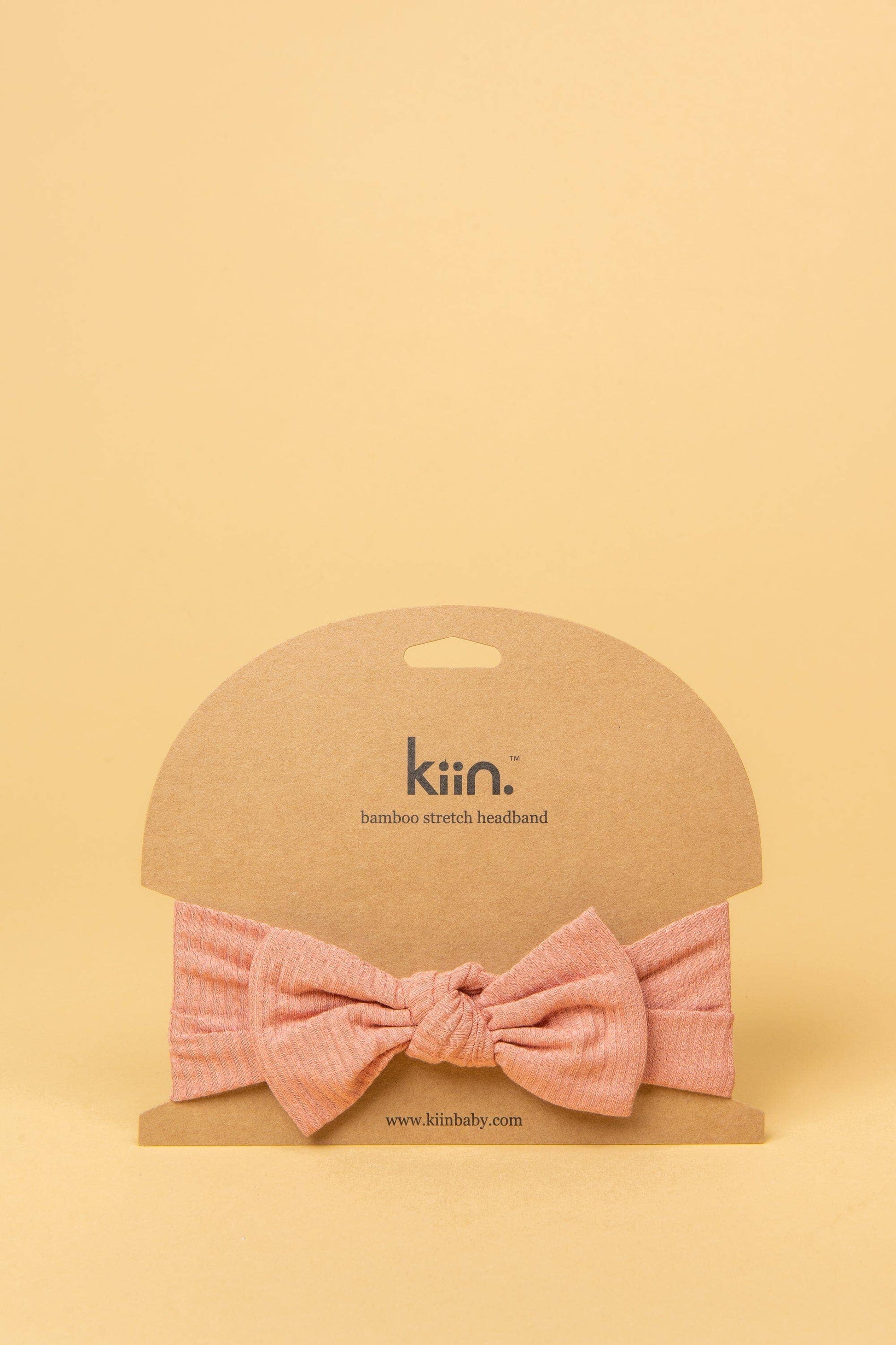Made from the most luxuriously soft bamboo fabric, in a trendy ribbed texture. The fabric is incredibly soft, and super stretchy. With a removable bow, this also doubles as a plain headband. Perfect for newborns, infants & toddlers.