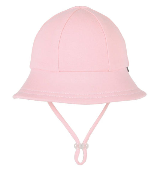 Our Baby Buckets have a soft flexible brim that introduces babies and toddlers to an angled brim that frames their line of sight. All Bedhead hats are made from our super-stretchy and lightweight cotton jersey and come with a stretchy chin strap