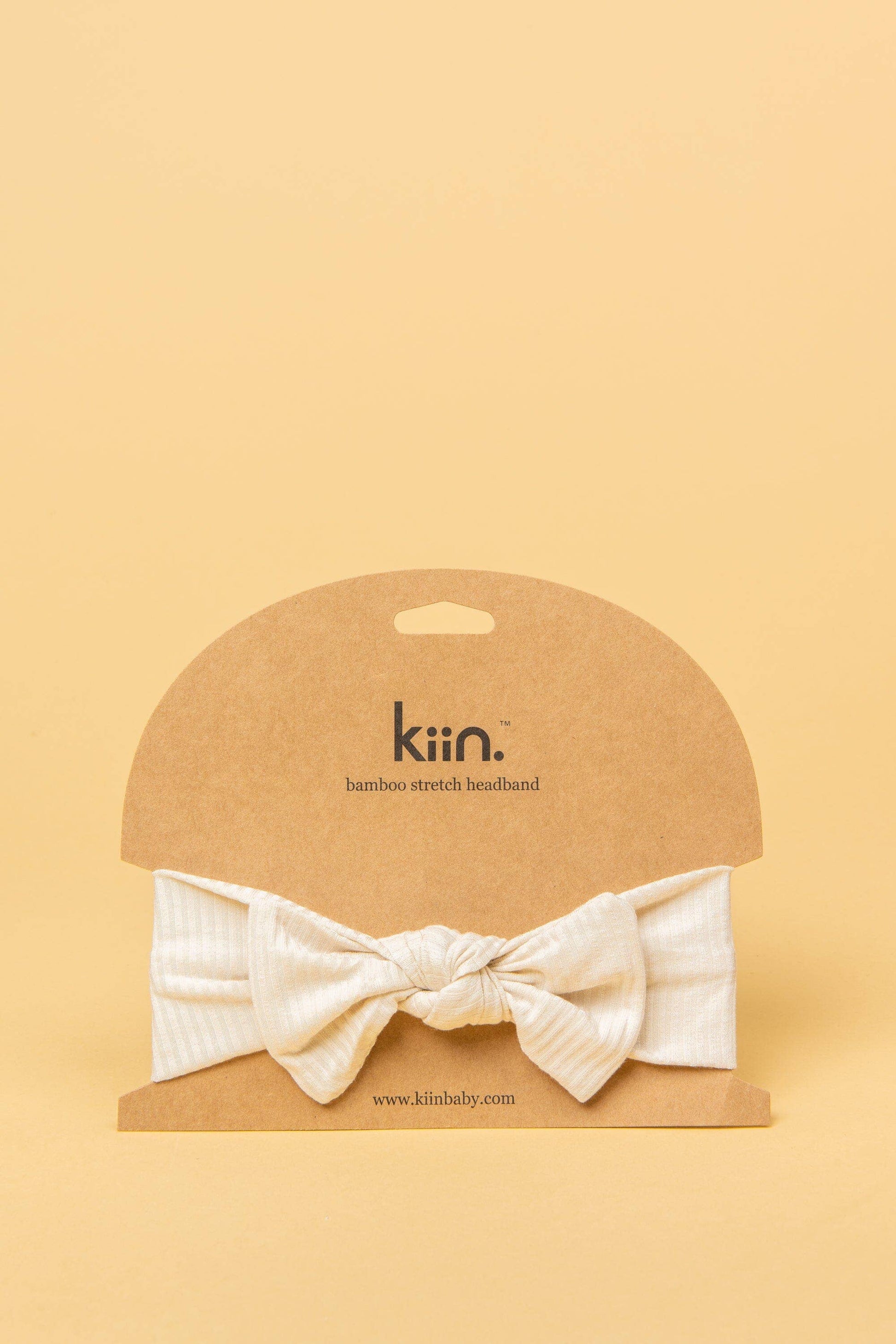Made from the most luxuriously soft bamboo fabric, in a trendy ribbed texture. The fabric is incredibly soft, and super stretchy. With a removable bow, this also doubles as a plain headband. Perfect for newborns, infants & toddlers.