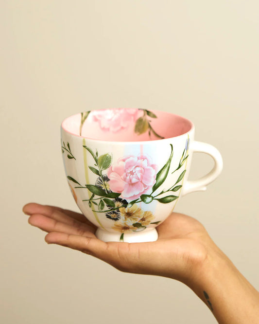 Re-imagining one of our most cherished designs from the 2000’s, the Alice Mug stays true to it’s heritage. Featuring intricate illustrated florals and hand brushing that extends into the interior. This much loved classic is now making a nostalgic comeback.