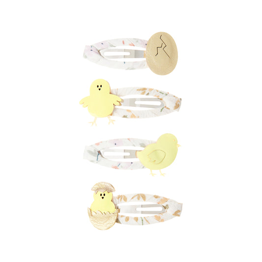 What an egg-cellent choice! We know your little chicks are going to just LOVE these fluffy little fellows!  4 in a pack 5cm floral ribbon wrapped clic clacs Sweet chicks and their eggs crafted from soft yellow and gold metallic leatherette fabric Warning! Not suitable for children under 36 months
