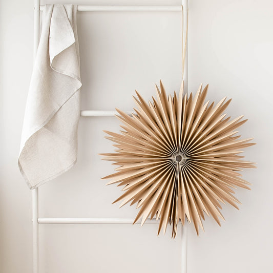 The vision was to create a show-stopping piece for you to hang in your homes, either in your window letting the light shine through its magical silhouette, or against a wall as a décor feature. Simply breathtaking just as they are, or group them together to create a statement. The hanging ornaments fold away with a magnetic closure for easy storage and shipping. 