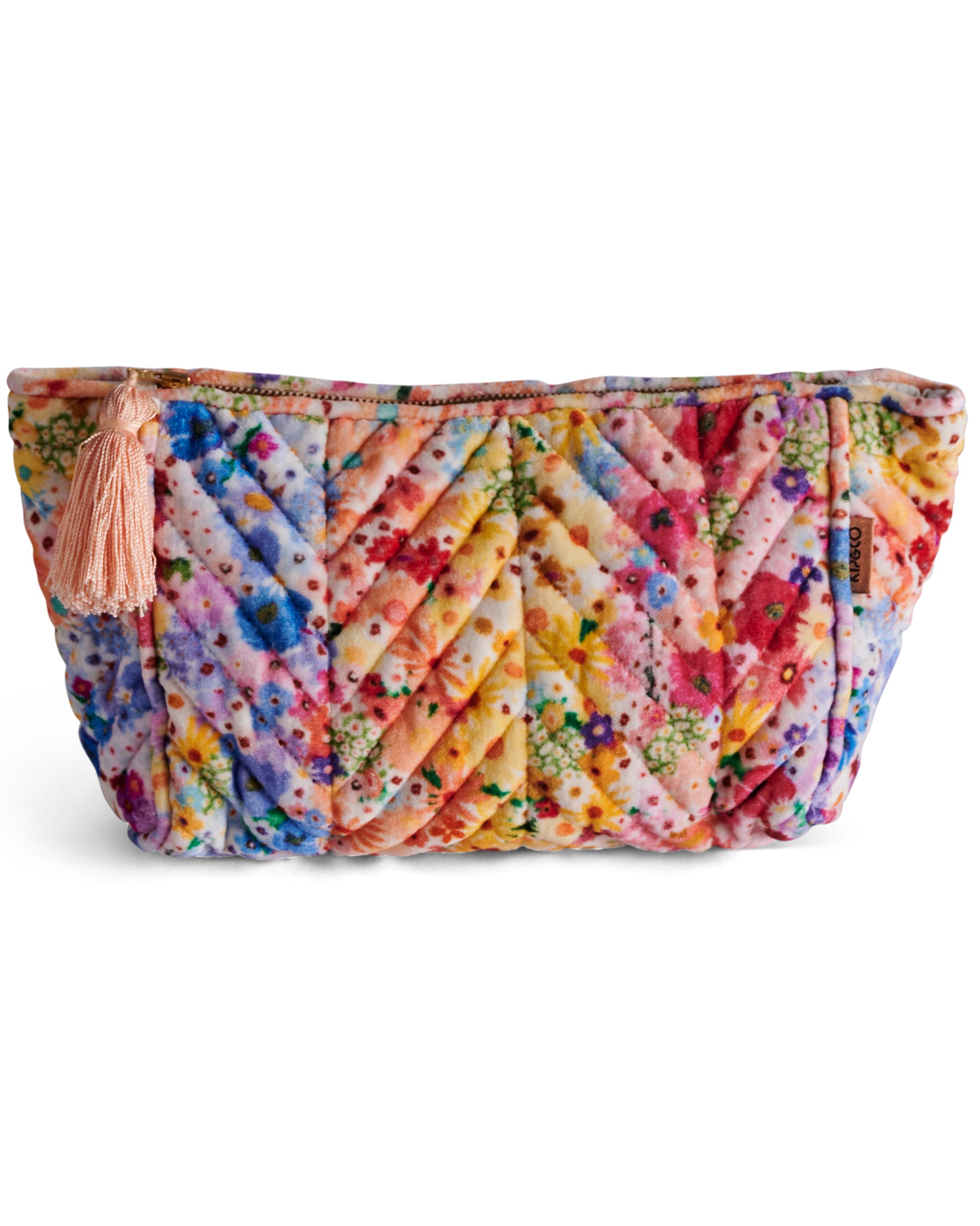 Our toiletry bags are an absolute must-have! Perfect for your everyday essentials and travel adventures, they keep all your best bits safe, secure, and stylishly zipped up. Made from our signature velvet, the Posie Lane Velvet Toiletry Bag features a delightful explosion of colourful blooms, with each flower bursting with playful charm and rainbow-filled joy. Finished with a pale pink zip tassel, this bag is as pretty as it is practical.