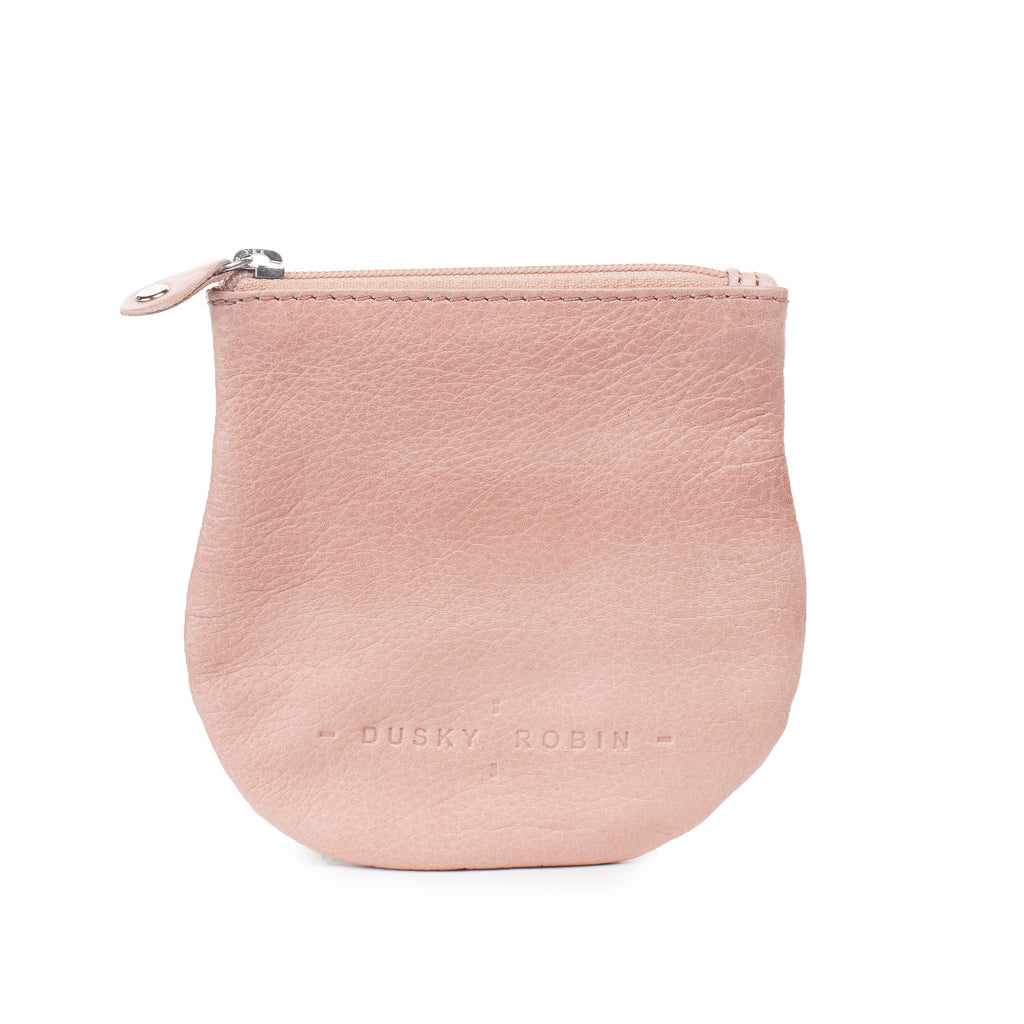 The Lilly coin purse is made from soft buttery leather. big enough to fit a few cards, notes and coins but small enough to slide in your back pocket.  Dimensions: 11.5 x 0.75 x11.5