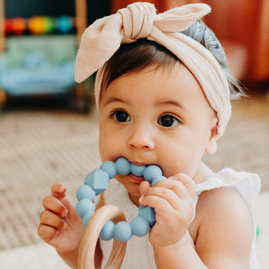 Offering your teething baby the best of both worlds, our award-winning Moon Teether combines a beech wood teething ring with a textured silicone teething ring that hits all the right sore spots in their little mouth.