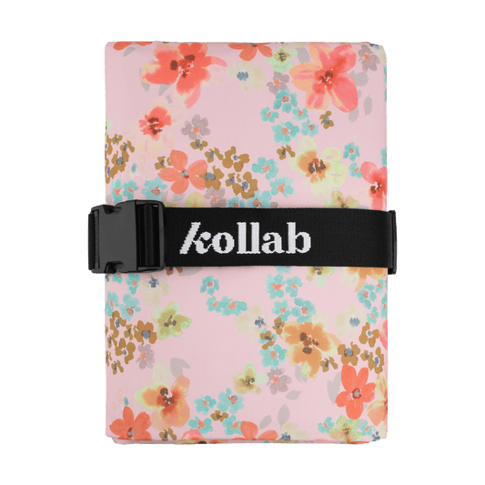 The bestselling Kollab Picnic Mat to share with your family and friends, now made from recycled plastic bottles as part of our Holiday Collection.  
  
Finally, a mat that really is big, water resistant and easy to fold! Having been frustrated with most large picnic mats out there that need to be folded up in the exact same way, we designed our picnic mats with an adjustable strap so that they don’t need to be folded in any specific way. Just fold or roll it up however you please and adjust the strap to sui