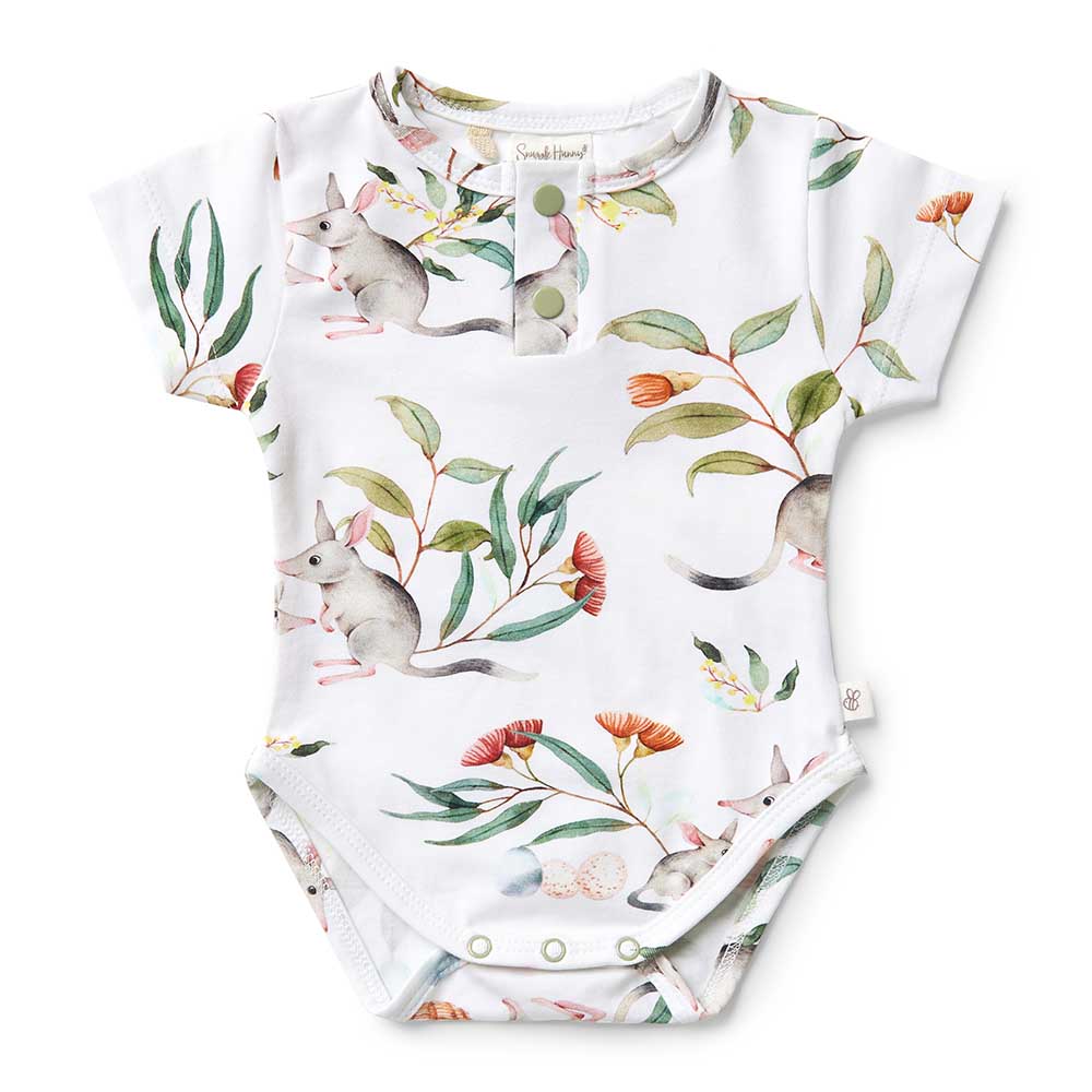 Soft and stretchy, our bodysuits are easy-care and coordinate well with our pants and shorts. Our bodysuits are also really comfortable to sleep in. All Snuggle Hunny clothing is made with GOTS Certified Organic Cotton CU 1182228.  The Bilby print is part of our Easter collection. 