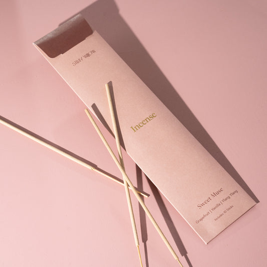 Our Sweet Muse Incense sticks provide you you with a beautiful aroma that will transport you to a warm summers night. Our Incense sticks are made using natural wood powder hosting essential oils of pink grapefruit + ylang ylang, a scent that will welcome you into the day as they uplift your senses.  Essential Oil Blend: Pink Grapefruit + Ylang Ylang