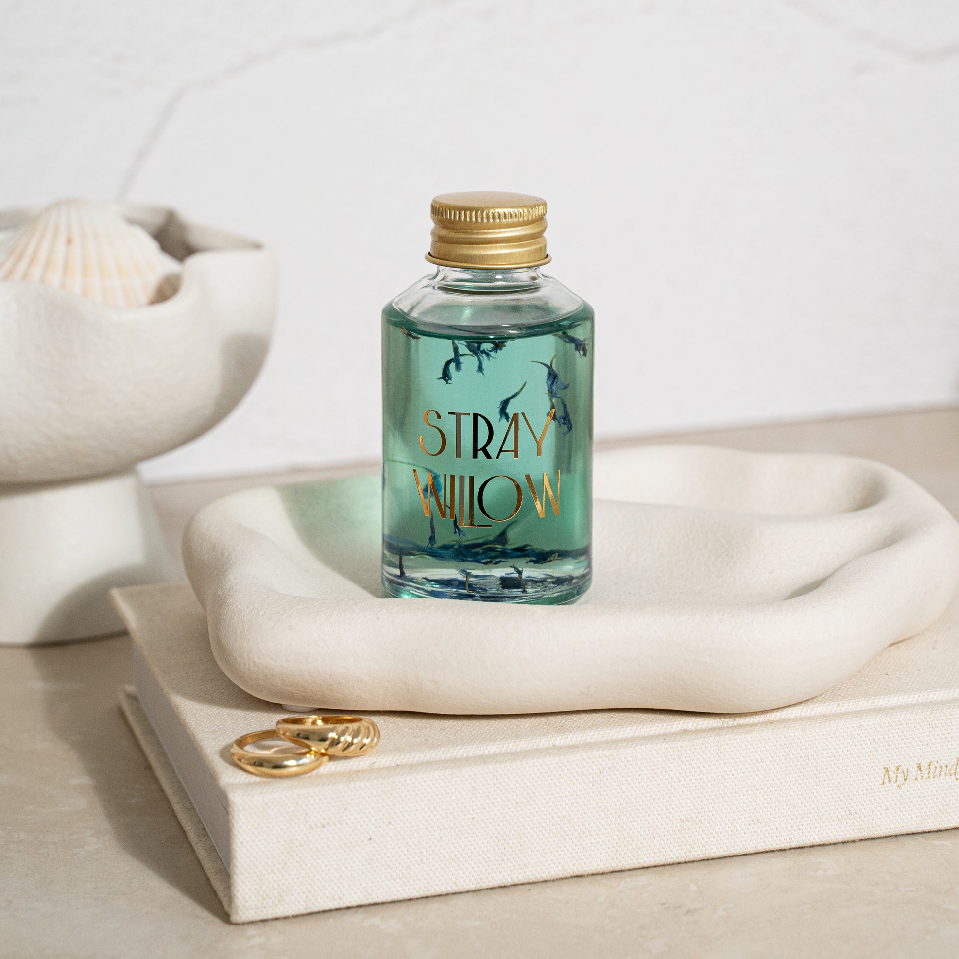 Our Idle Falls Body &amp; Bath Oil is here to help you indulge in daily self care rituals, providing nourishment to your skin, hair and nails. A lightweight oil infused with vitamins and essential fatty acids to improve skins appearance while encapsulating your senses with a dreamy blend of essential oils.