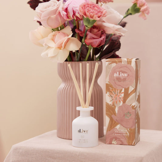 <span>Infuse your space with this Mini Diffuser in a limited edition "A Moment to Bloom" scent. Enjoy the invigorating scent of blossoming flowers, encapsulated in a beautifully designed vessel inspired by growth and renewal through delicate watercolour florals.</span><br data-mce-fragment="1"><br data-mce-fragment="1"><span>With a subtle fragrance release that lingers, this diffuser will add a touch of elegance and create a sense of calm and ease in any space</span>