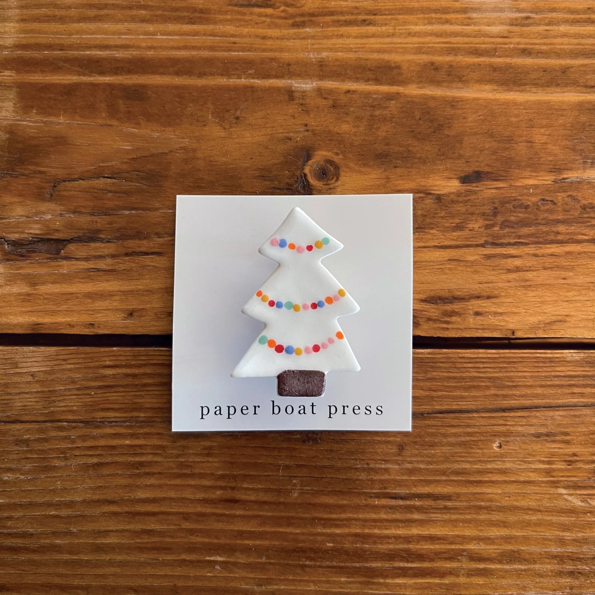Lovingly handmade in Brisbane, Australia our brooches are made using cream/white earthenware clay with a gloss glaze on the front. Each brooch is handpainted and designed with bright, bold colours in our Brisbane studio.