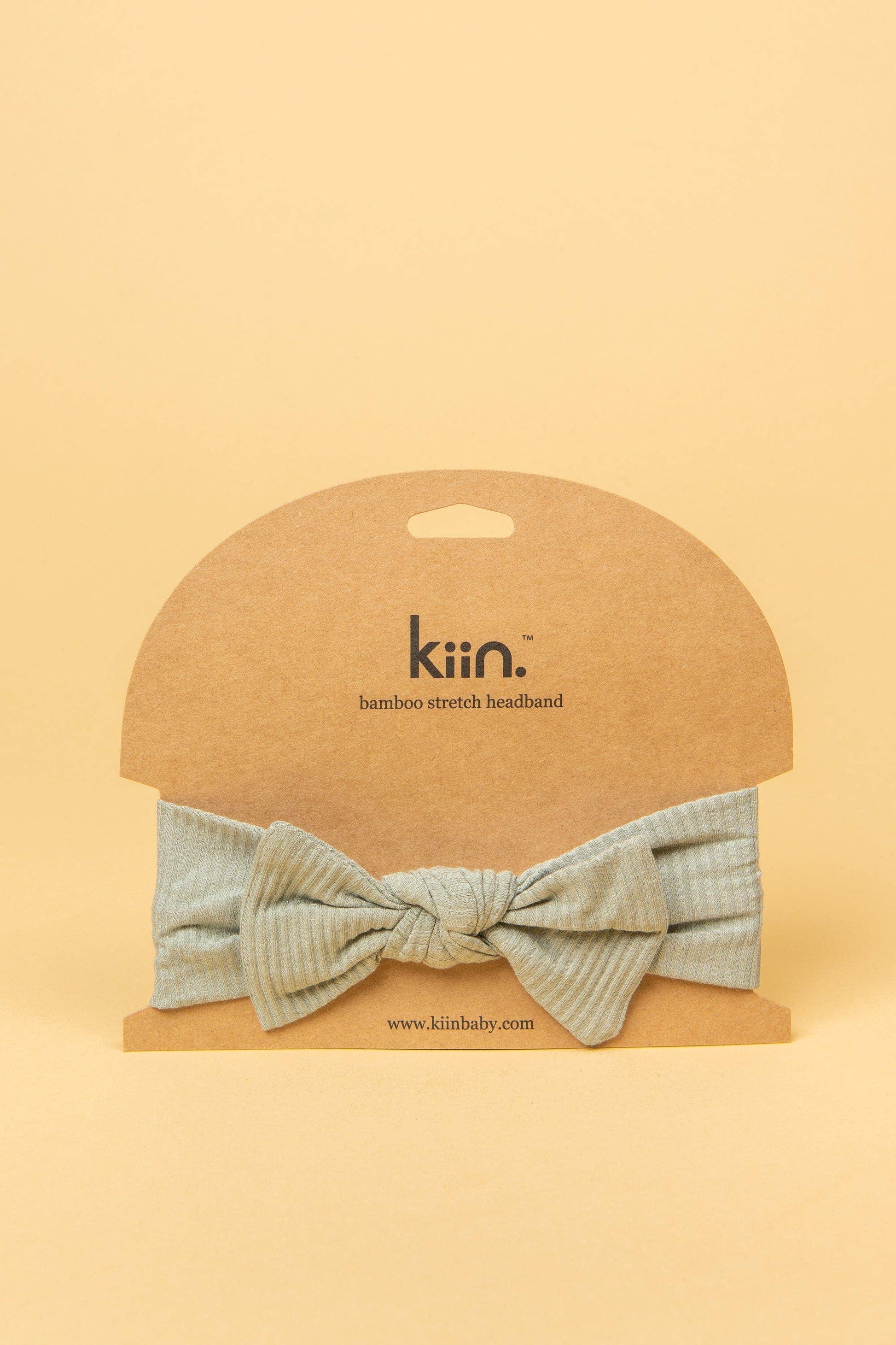 Made from the most luxuriously soft bamboo fabric, in a trendy ribbed texture. The fabric is incredibly soft, and super stretchy. With a removable bow, this also doubles as a plain headband. Perfect for newborns, infants & toddlers.