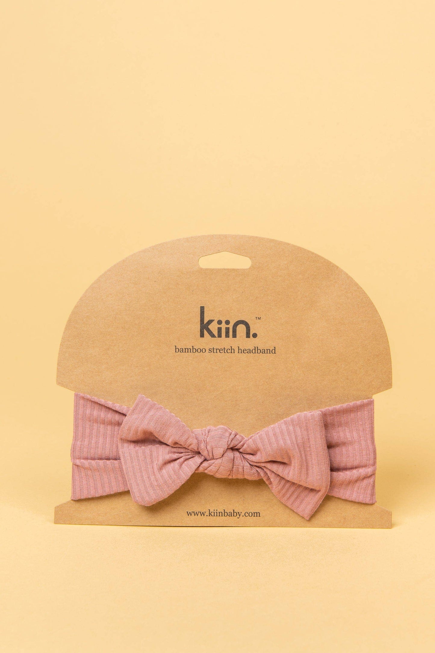 Made from the most luxuriously soft bamboo fabric, in a trendy ribbed texture. The fabric is incredibly soft, and super stretchy. With a removable bow, this also doubles as a plain headband. Perfect for newborns, infants & toddlers.