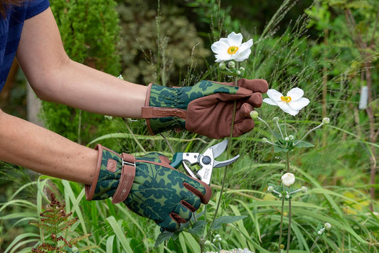 Oak Leaf Garden Gloves by burgon and ball These ultra-soft gloves have been created in hardwearing fabric that doesn't stiffen when it gets wet. The padded palm gives extra cushioning to protect hands during tough or repetitive tasks, and there’s two-way stretch mesh between the fingers to keep hands cool and improve dexterity. A wrist strap ensures a snug fit and stops debris dropping into glove, with a hook-and-loop fastening that’s easy to open and close.