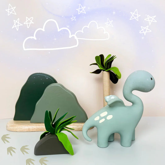 Step into a world where teething turns into a magical journey with&nbsp;Diplo the Dragon!

Diplo, a whimsical creation with a blend of a gentle diplodocus and a mythical dragon.

Diplo is more than just a teether — he’s a magical journey to find comfort and enchantment.

Hold Diplo’s winding neck to chew on his soft prehistoric head, a tail to help reach further back into the mouth and 4 legs to offer more sold chewing suppo