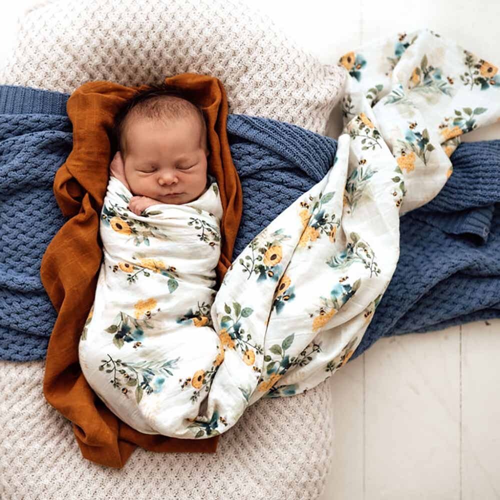 Snuggle Hunny soft organic cotton muslin wrap features our exclusive and limited edition Garden Bee design and is a beautiful multi-purpose wrap ideal for swaddling and wrapping bub.