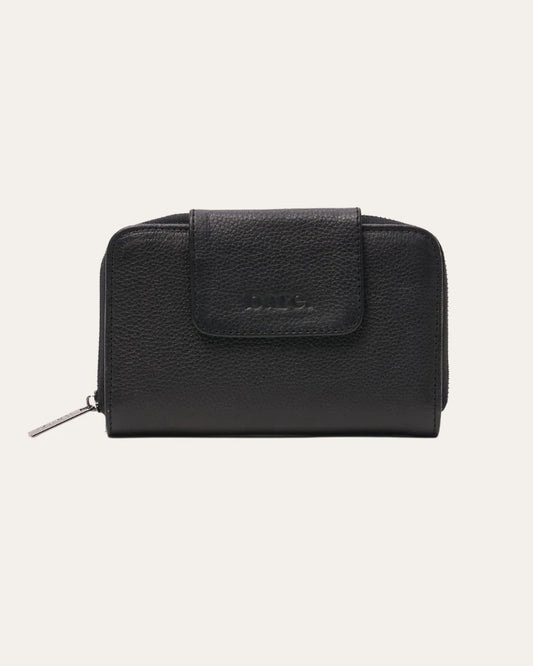 The Jorja Wallet is the perfect combo of functionality and timelessness - with a compact size that'll fit all your essentials, plus a secure fold-over flap with a magnetic clasp that'll never let you down.  It's the kind of wallet that'll become your forever companion!
