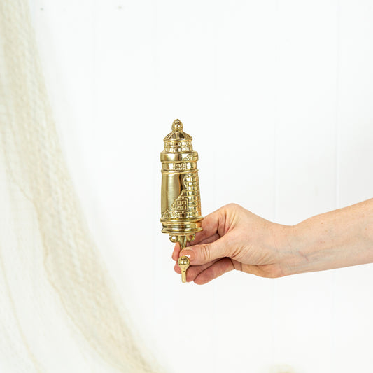 This sweet brass lighthouse hook has been designed exclusively for Coastal Vintage.

Perfect for bath and beach towels, or fit a row of lighthouse in an entrance way for hats and bags.

Great for creating that beach-house style.