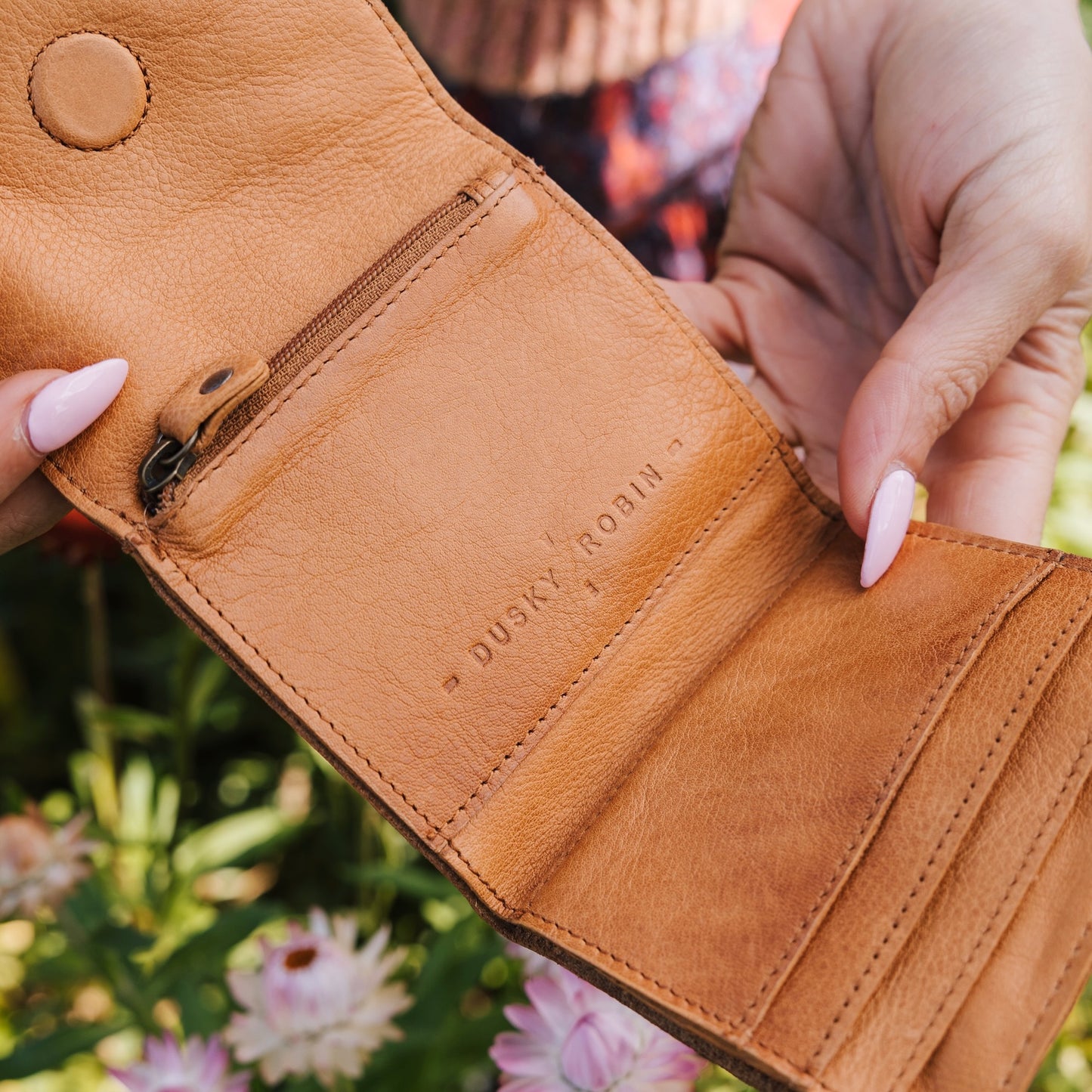 Small, unisex + super functional, our Making Waves purse features: - 3 card slots - a section for notes - coin section with zip closure - small + compact to fit in the pocket of your jeans or clutch  10 x 9.5 x 1 cm 
