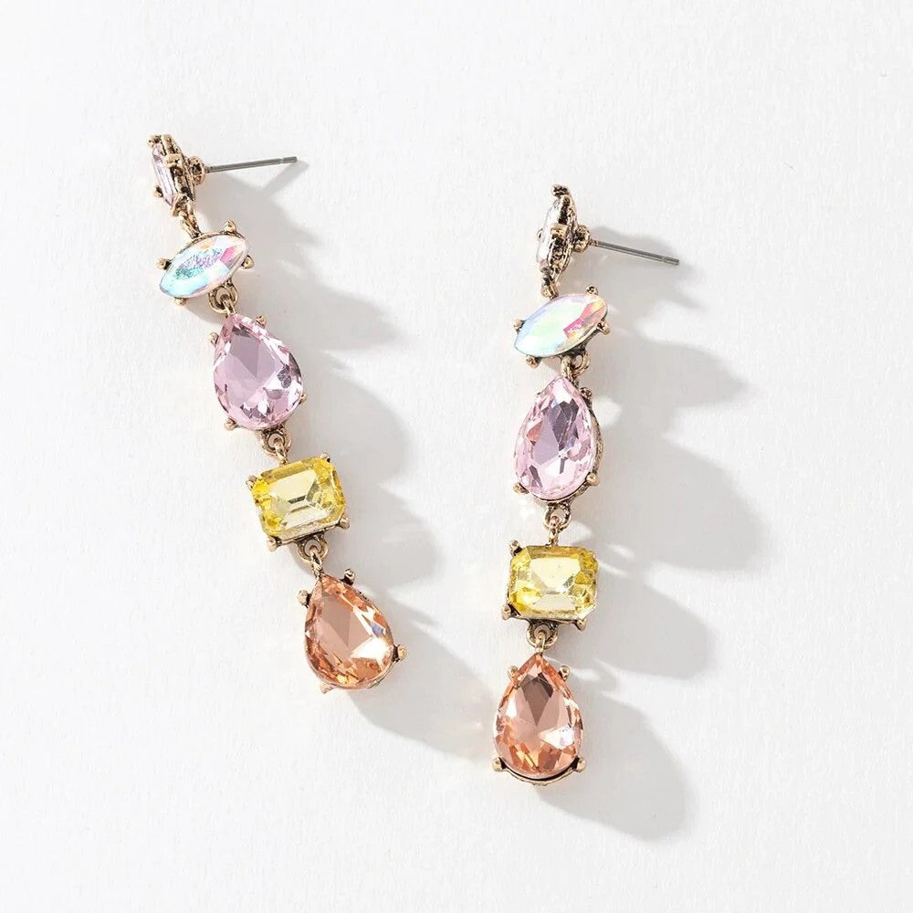 Elevate your evening with our exquisite layered crystal drop dangle earrings in a pastel mix of colours (pink, champagne, yellow and clear crystals).  Designed for those special moments, these earrings add a touch of glamour and sophistication to your look.
