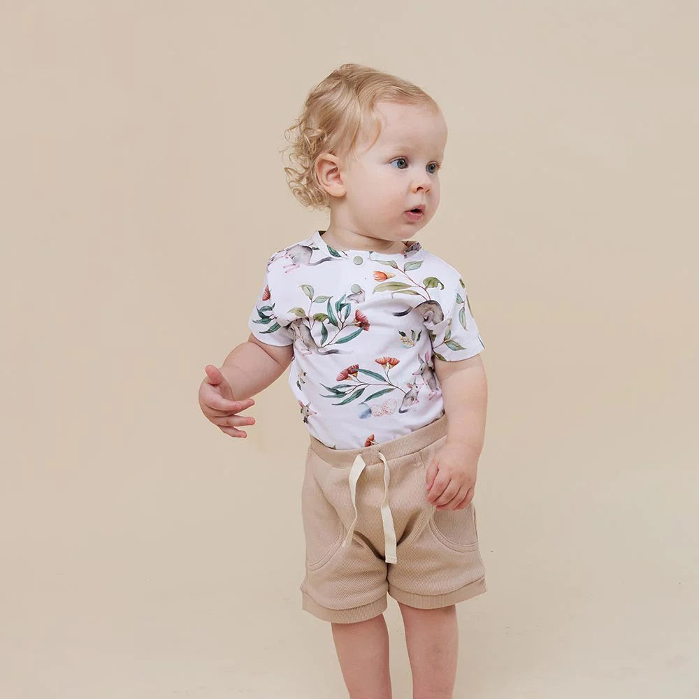 Soft and stretchy, our bodysuits are easy-care and coordinate well with our pants and shorts. Our bodysuits are also really comfortable to sleep in. All Snuggle Hunny clothing is made with GOTS Certified Organic Cotton CU 1182228.  The Bilby print is part of our Easter collection. 