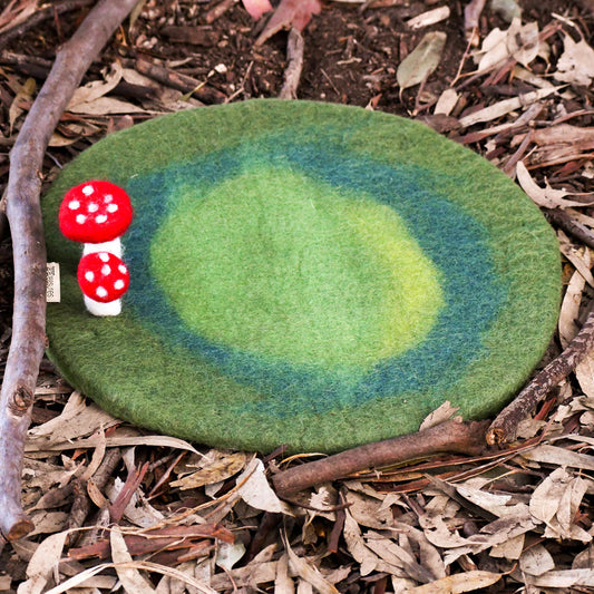 Create the perfect backdrop to an invitation to play for your fairy houses, loose parts play or wooden treehouses. Our&nbsp;toadstool felt playscape has a graduation of colours and two needle-felted toadstools sewn on it.