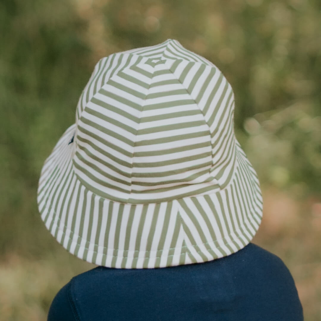 Our Toddler Buckets have a soft flexible brim that introduces babies and toddlers to an angled brim that frames their line of sight. All Bedhead hats are made from our super-stretchy and lightweight cotton jersey and come with a stretchy chin strap