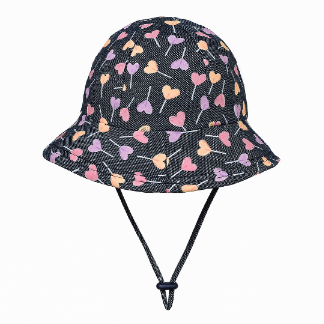 Our Toddler Buckets have a soft flexible brim that introduces babies and toddlers to an angled brim that frames their line of sight. All Bedhead hats are made from our super-stretchy and lightweight cotton jersey and come with a stretchy chin strap