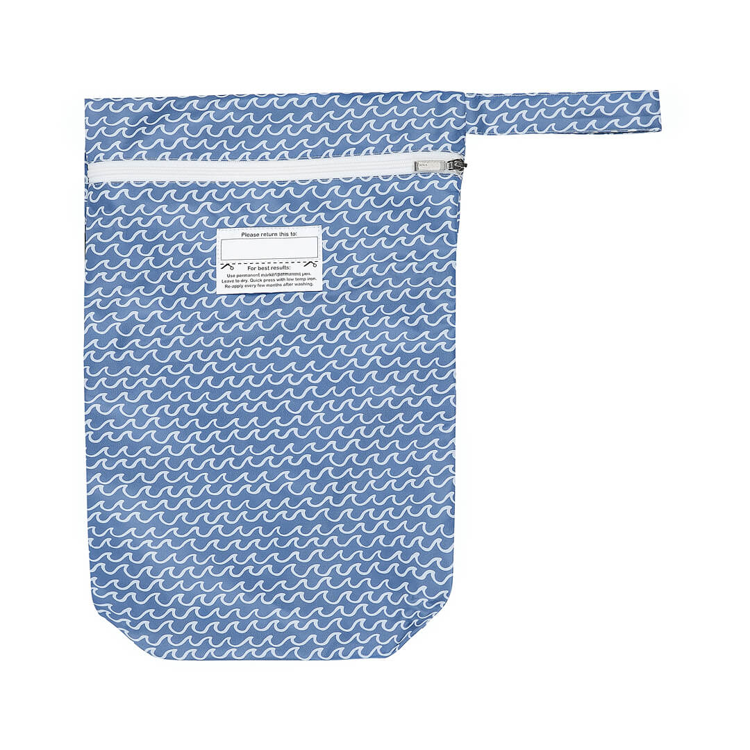The Bedhead Wet Bag is perfect for getting damp items home safely from the beach or pool - without saturating everything else!  Simply wring out wet cossies, pop them in Wet Bag and close the zip.   Ride the waves in our Tide hat – simple white waves on the perfect blue background – the closest to denim we could get in our swim fabric! 