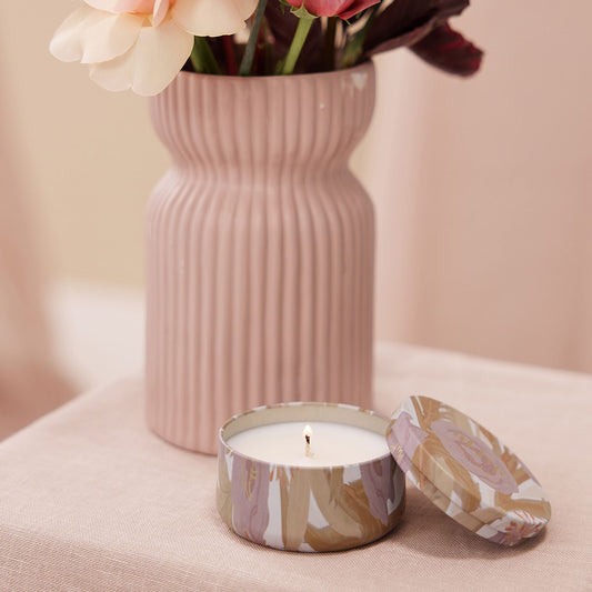 <span>Create a sense of calm and tranquillity with the Mini Soy Candle in a limited edition 'A Moment to Bloom' scent.</span><br data-mce-fragment="1"><br data-mce-fragment="1"><span>Hand-poured in a beautifully designed vessel, immerse yourself in uplifting floral fragrances, elevating your space and celebrating nature's beauty.</span>