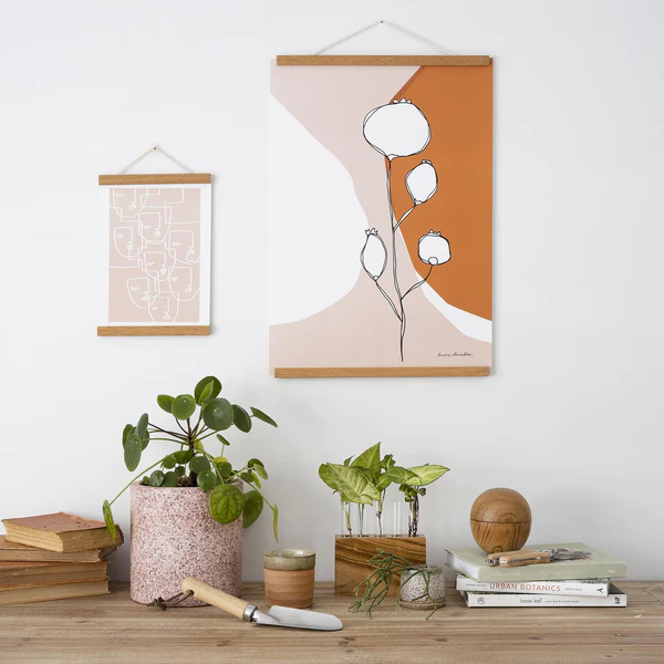&nbsp;The perfect, quick and easy way to hang&nbsp;art in your home.  Each set contains four wood bars&nbsp;embedded with strong magnets. Just clamp your&nbsp;art between the two wood pieces on top and bottom and it's ready to hang!
