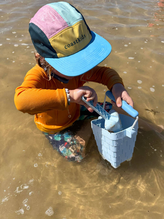 Made from the same quality silicone as our palm beach bucket, but in a square-based castle shape - exclusively designed by coast kids.

Our silicone beach toys are designed to be mixed and matched, squished and squashed for easy travelling.