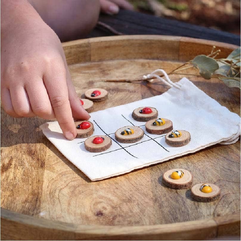 This kit is heaps of fun to make and then carry around in the bag which doubles up at the grid to play a game on the go or at home. Glue the wooden bees and ladybirds onto the wood chips before you can start playing your game.