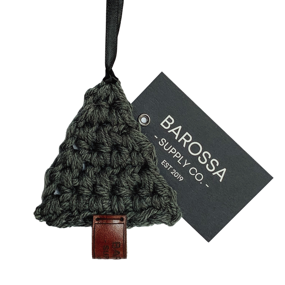 Handmade in the Barossa Valley, our crochet Christmas Tree Ornament will add charm to your Christmas decorating. These ornaments are designed to enhance any Christmas tree, wreath, garland, or even your festive table settings. Their size and design make them versatile for all your Christmas decorating needs and make the perfect heirloom Christmas gift.  Materials: Mixed yarn fibers, satin ribbon, leather tag. 